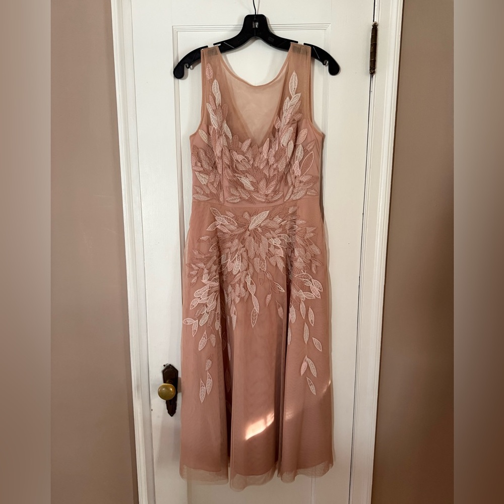 Embroidered blush pink dress with tulle skirt, excellent condition.